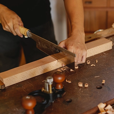 Hand saw in a carpentry work shop