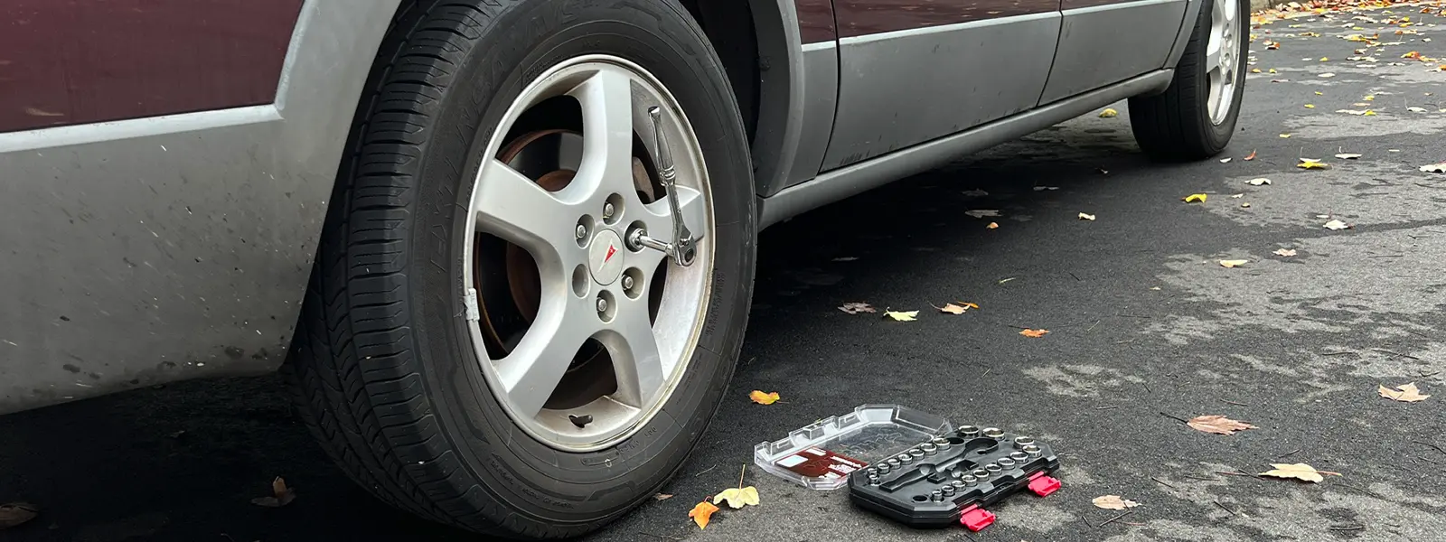 change a tire with a socket wrench