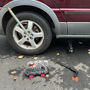 Change a Tire with a socket wrench