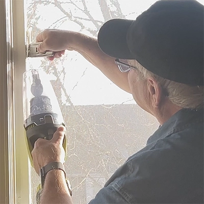 Hand Tool Safety Basics for New DIYers (Safety First – Always) 7 Cleaning paint off a window
